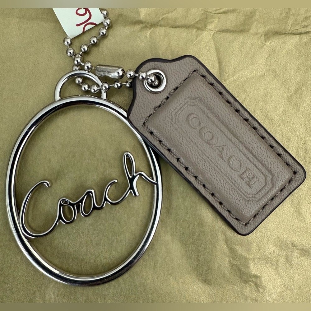 Coach (✨B1G1 1/2 off) Oval Script Metal and Brown Leather Hangtags